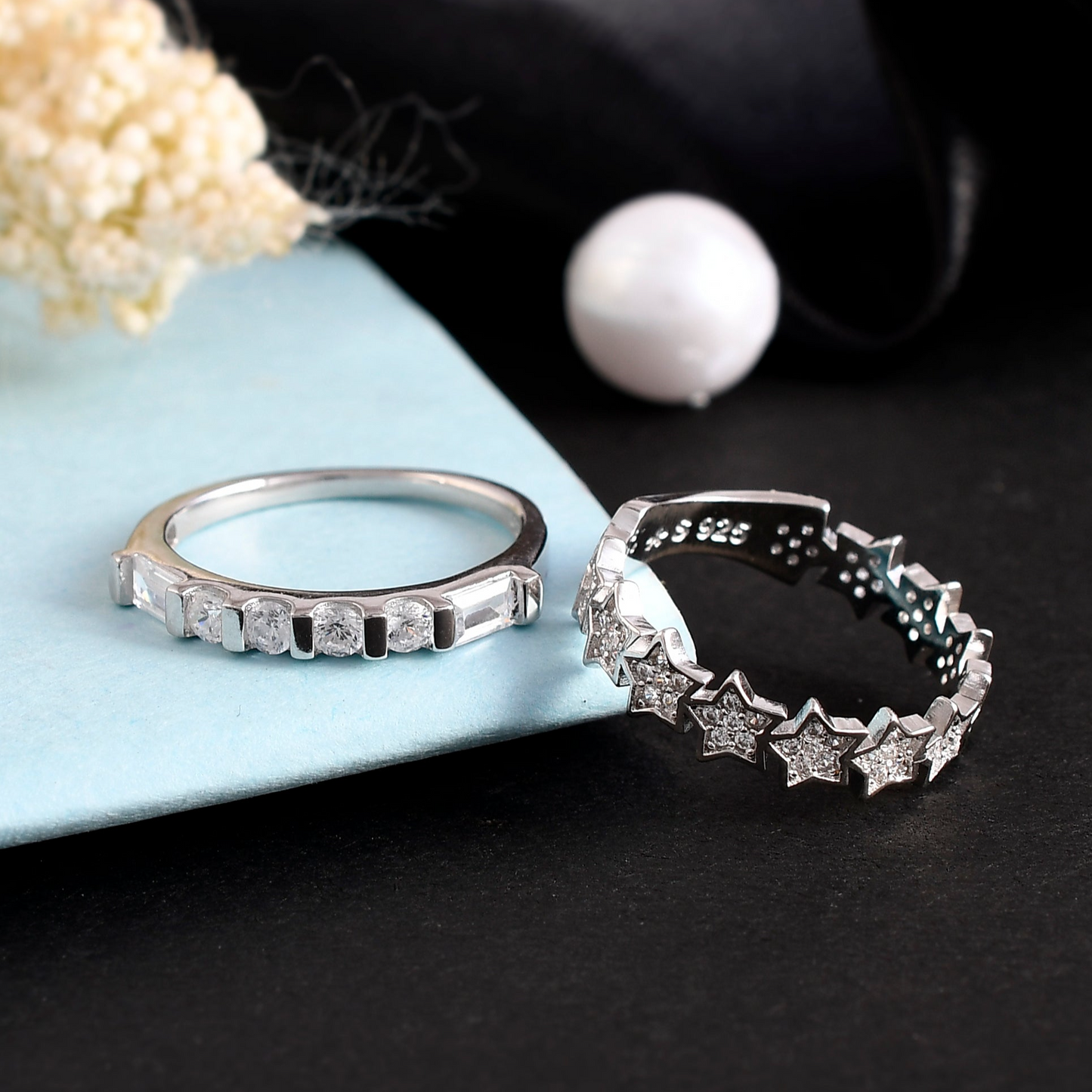 SILVER STAR BAND CUPID RING